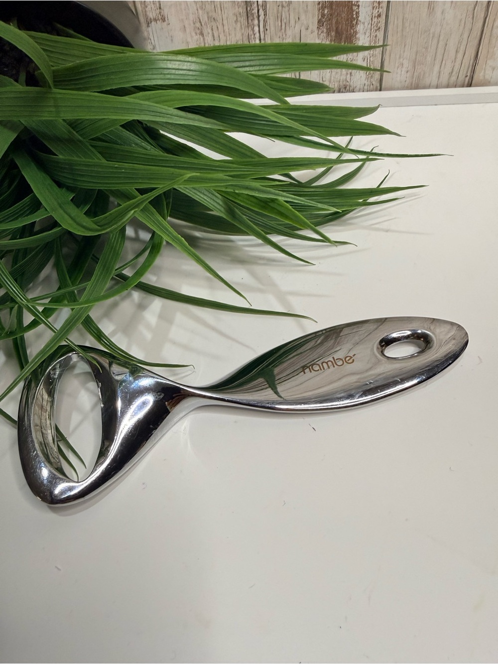 Nambe Polished Silver Bottle Opener with Sleek Ergonomic Handle - Picture 2 of 8